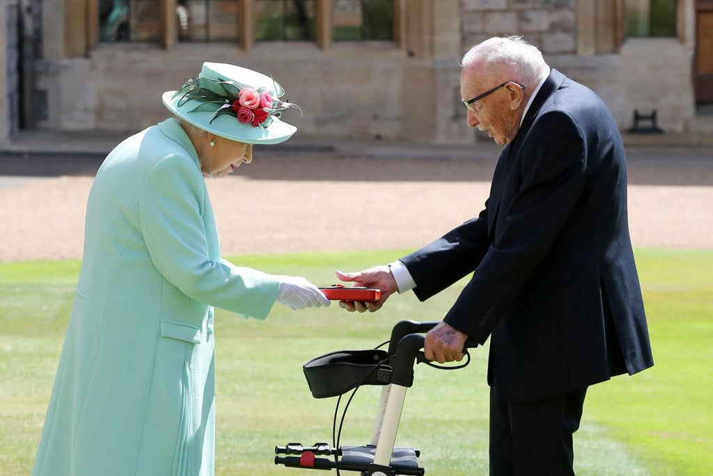 Queen knights Captain Tom Moore at Windsor Castle